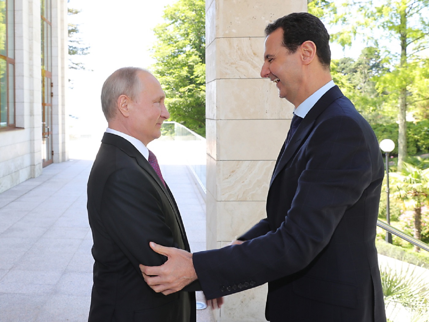 Le prÃ©sident russe Vladimir Poutine avec le dirigeant syrien Bachar al-Assad.